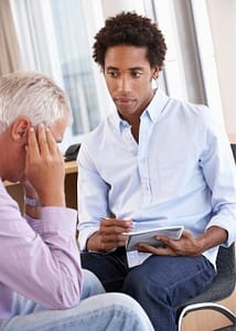 Man with male counsellor