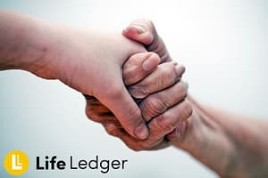 Life Ledger logo with people holding hands
