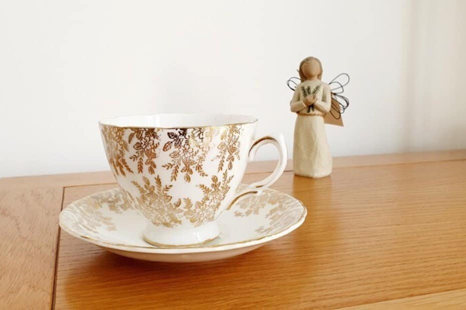 Golden tea cup and saucer